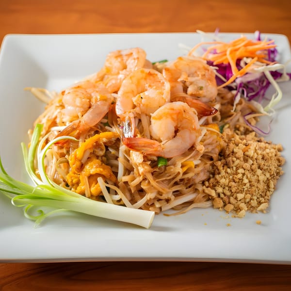 SaiMai Thai Restaurant's shrimp Pad Thai with noodles, bean sprouts, peanuts, and fresh vegetables.